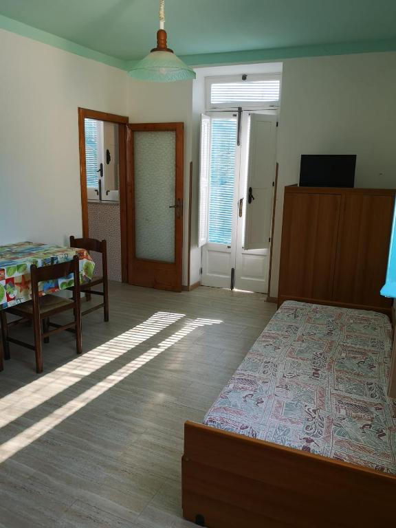 Postel nebo postele na pokoji v ubytování Casa Vittorio B&b