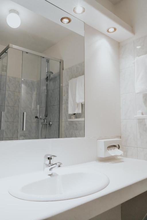 Koupelna v ubytování Hotel am Kapuzinerplatz