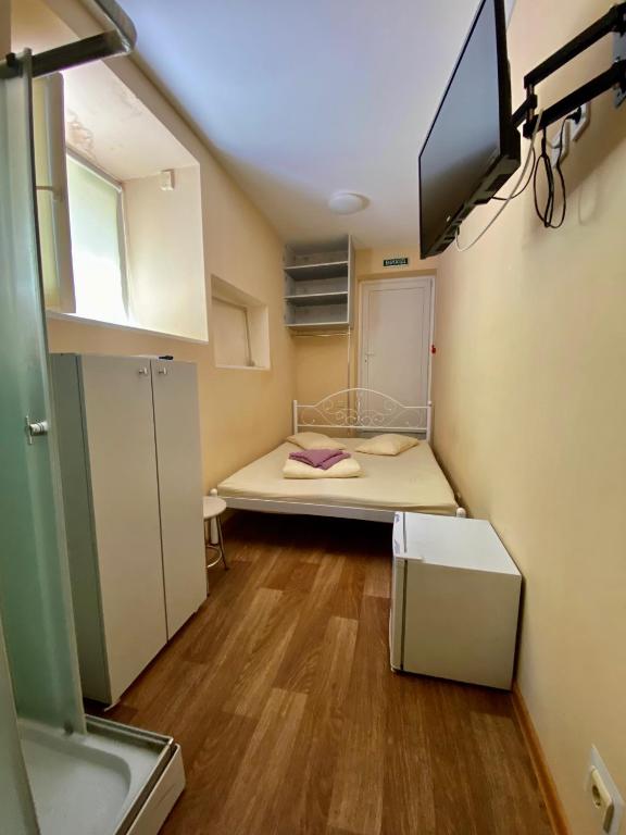 Postel nebo postele na pokoji v ubytování Адмирал хостел