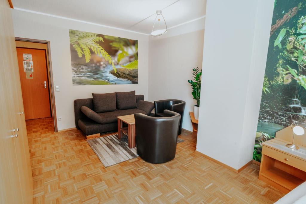 Posezení v ubytování Hotel am Kapuzinerplatz