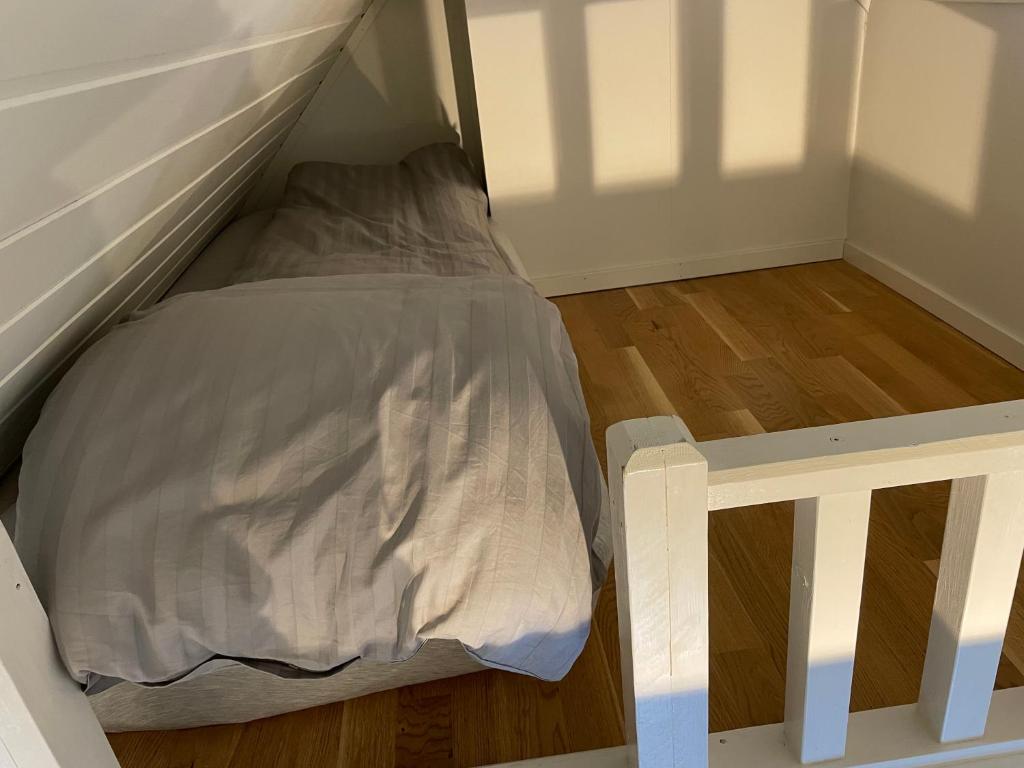 Postel nebo postele na pokoji v ubytování Novatind - Studio apartment with free parking