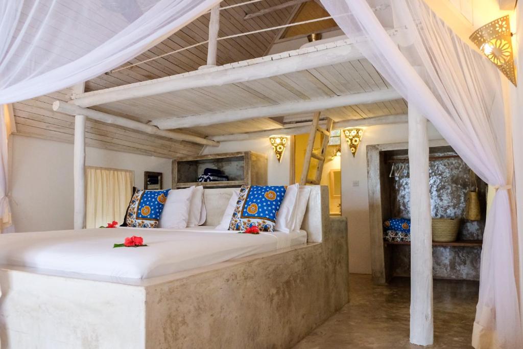 Кровать или кровати в номере Sharazad Oasis Retreat