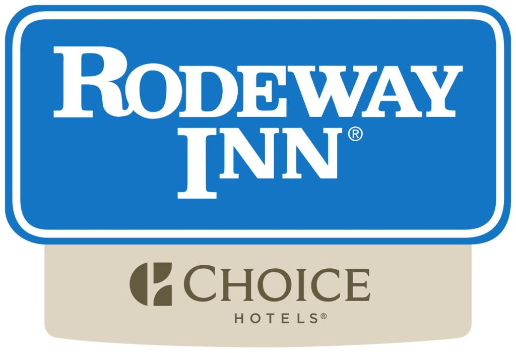 a blue sign that says rolex way in a choice hotel at Rodeway Inn in Gastonia