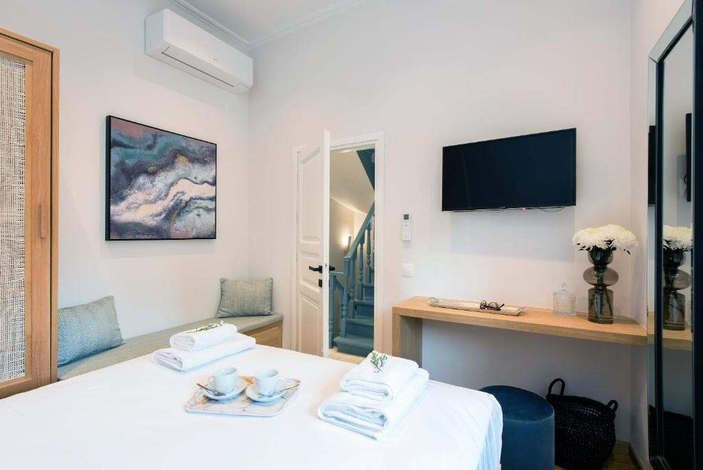 A bed or beds in a room at Arieni Sea View House