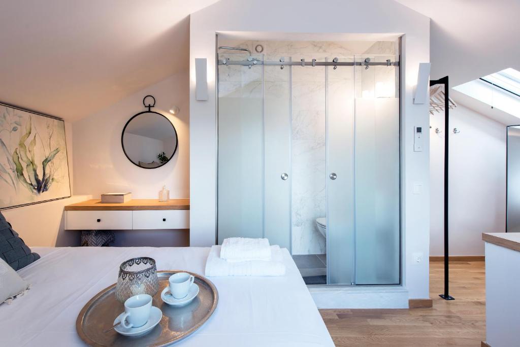 A bed or beds in a room at Arieni Sea View House