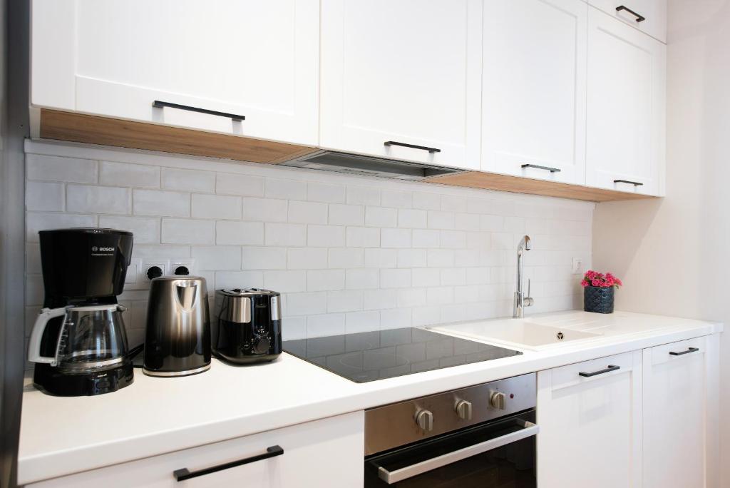 A kitchen or kitchenette at Arieni Sea View House