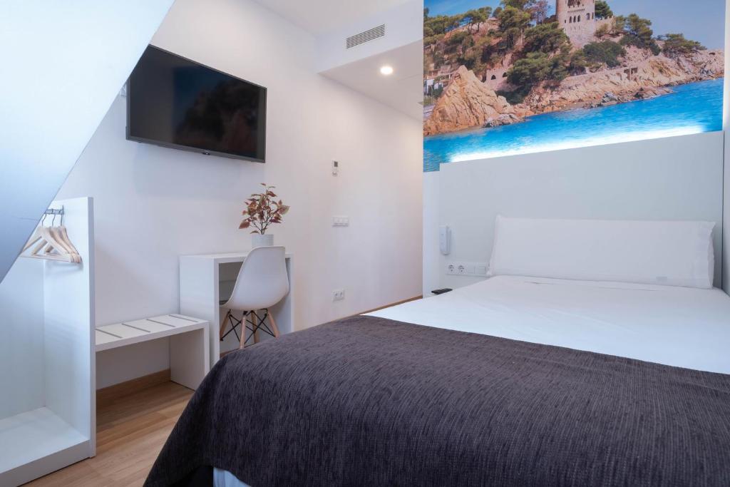 Posteľ alebo postele v izbe v ubytovaní Hotel BESTPRICE Girona
