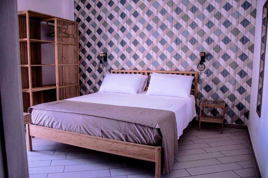 Posteľ alebo postele v izbe v ubytovaní Walk Rooms