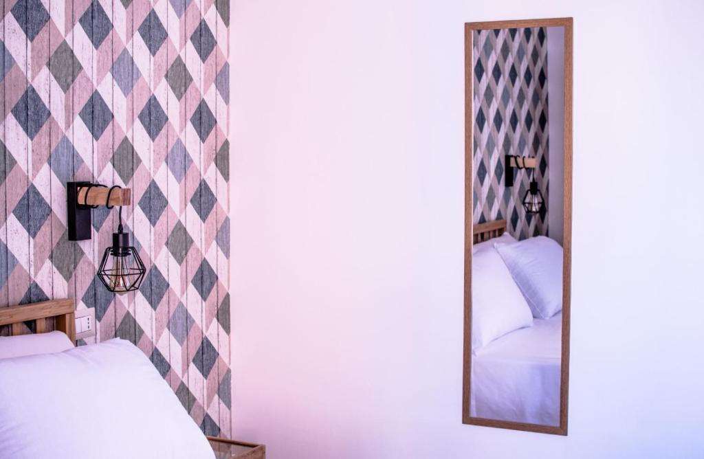 Posteľ alebo postele v izbe v ubytovaní Walk Rooms