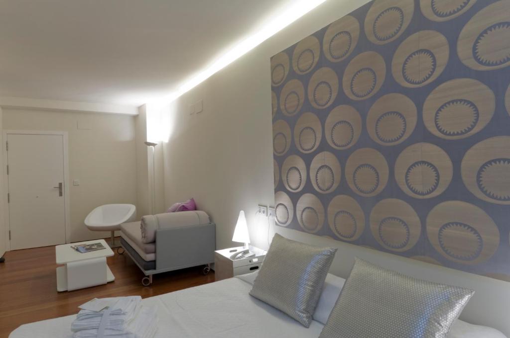 Posteľ alebo postele v izbe v ubytovaní Hotel Viento10
