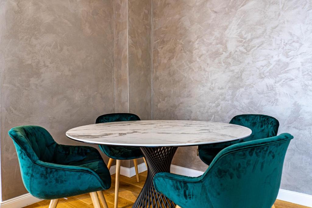 Posezení v ubytování Rosso Aparthotel
