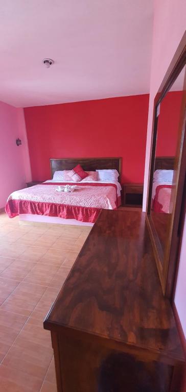 Postel nebo postele na pokoji v ubytování Hotel El Rancherito