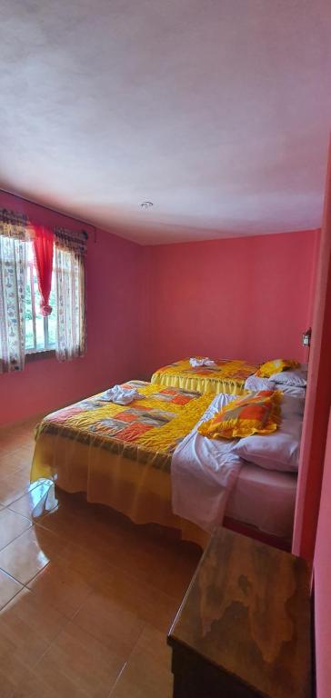 Postel nebo postele na pokoji v ubytování Hotel El Rancherito