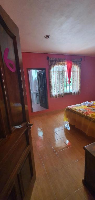 Postel nebo postele na pokoji v ubytování Hotel El Rancherito