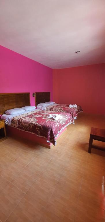 Postel nebo postele na pokoji v ubytování Hotel El Rancherito