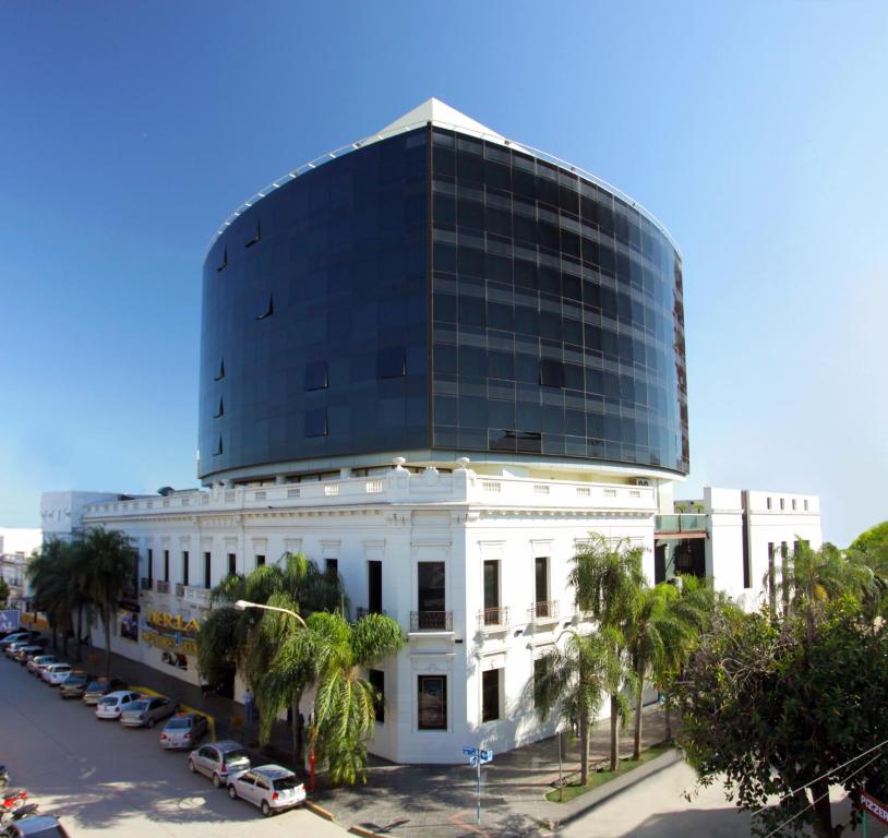 a large building with a large dome on top of it at Amérian Hotel Casino Gala in Resistencia