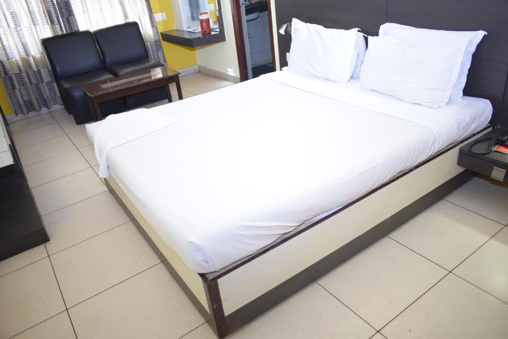 Postel nebo postele na pokoji v ubytování Devis Grand