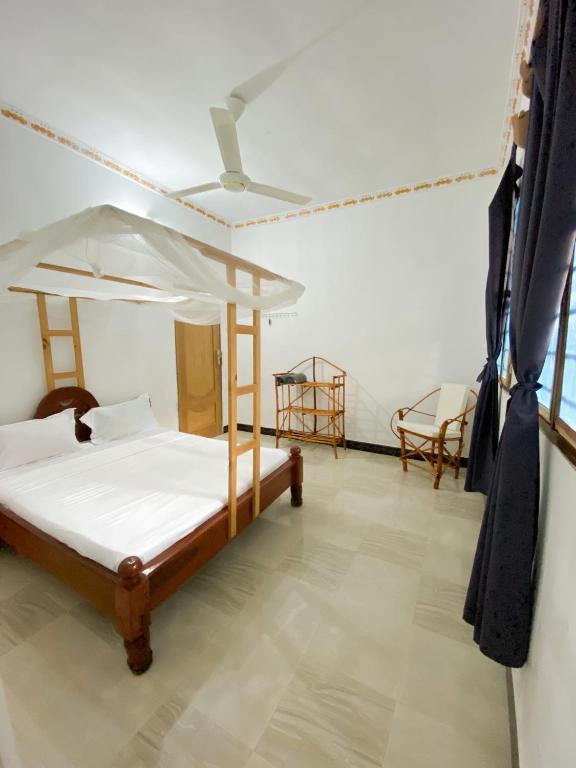 Postel nebo postele na pokoji v ubytování Lighthouse Guesthouse