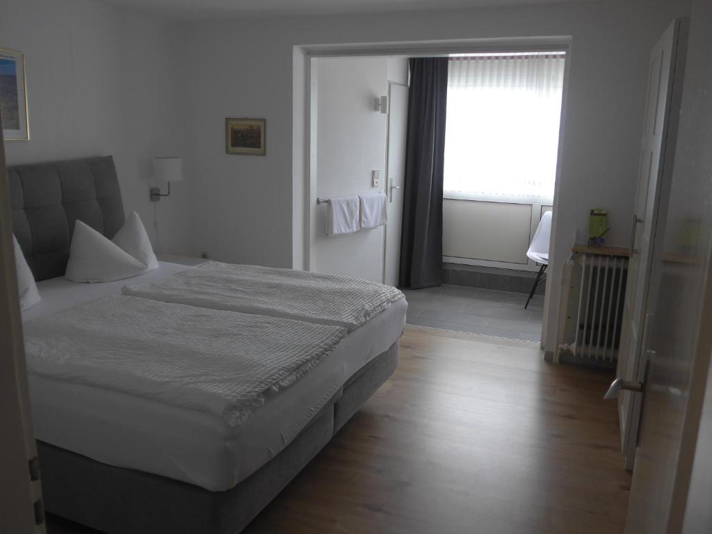 Postel nebo postele na pokoji v ubytování Pension Schneider