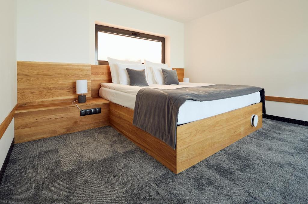 Postel nebo postele na pokoji v ubytování Lemon Resort Spa
