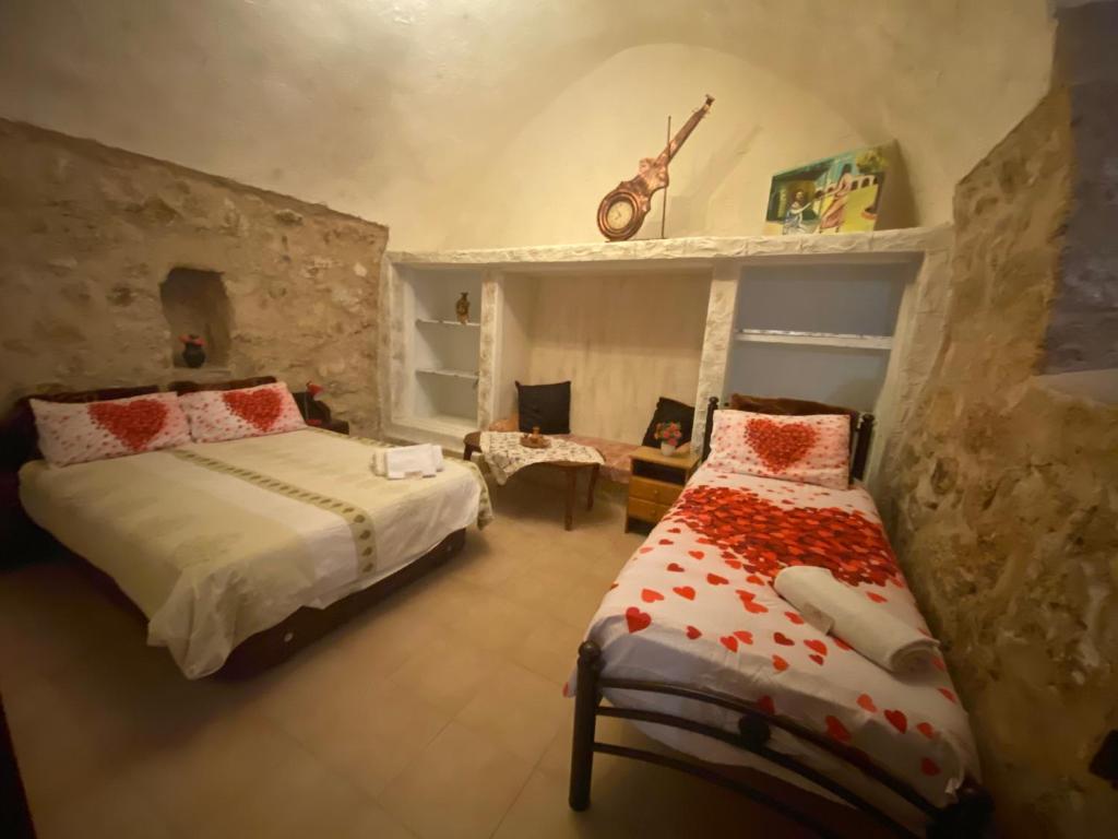Postel nebo postele na pokoji v ubytování Guest House Antique