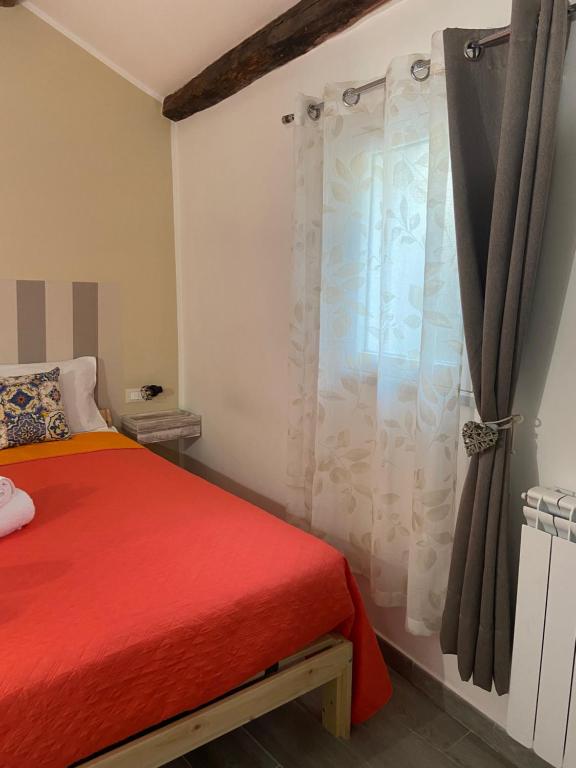 Postel nebo postele na pokoji v ubytování La Piccola Formica Charme Rooms