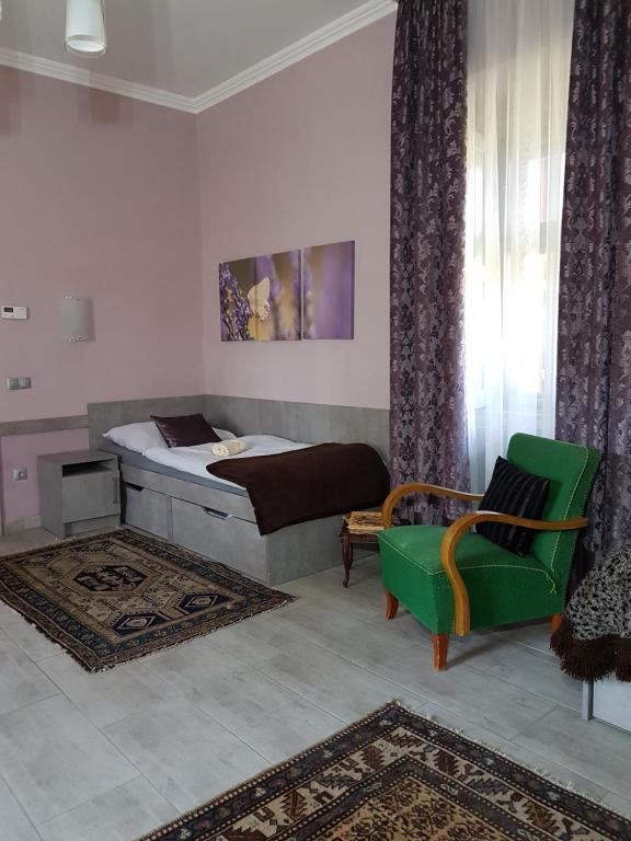 Posteľ alebo postele v izbe v ubytovaní Kétbodonyi Apartments