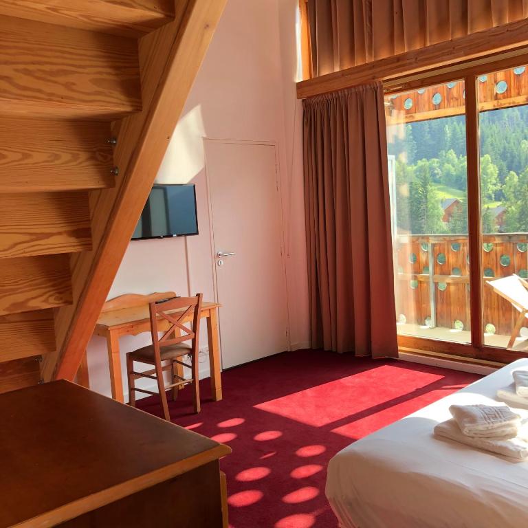 Postel nebo postele na pokoji v ubytování SUNWEB - Timberlodge