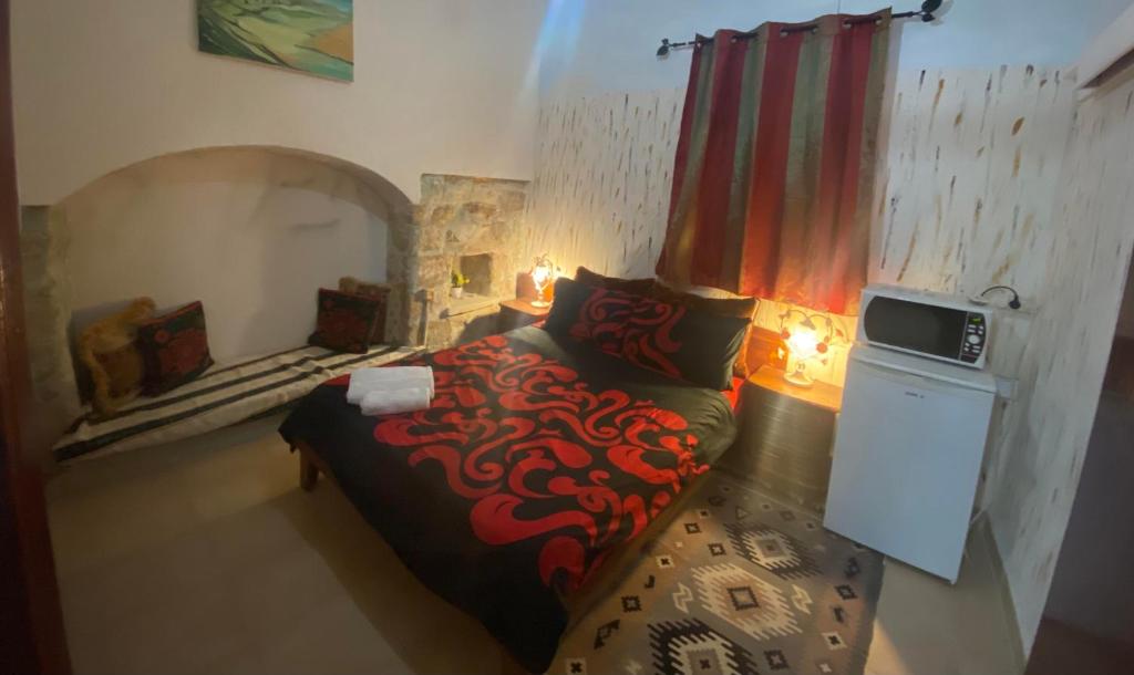 Postel nebo postele na pokoji v ubytování Guest House Antique
