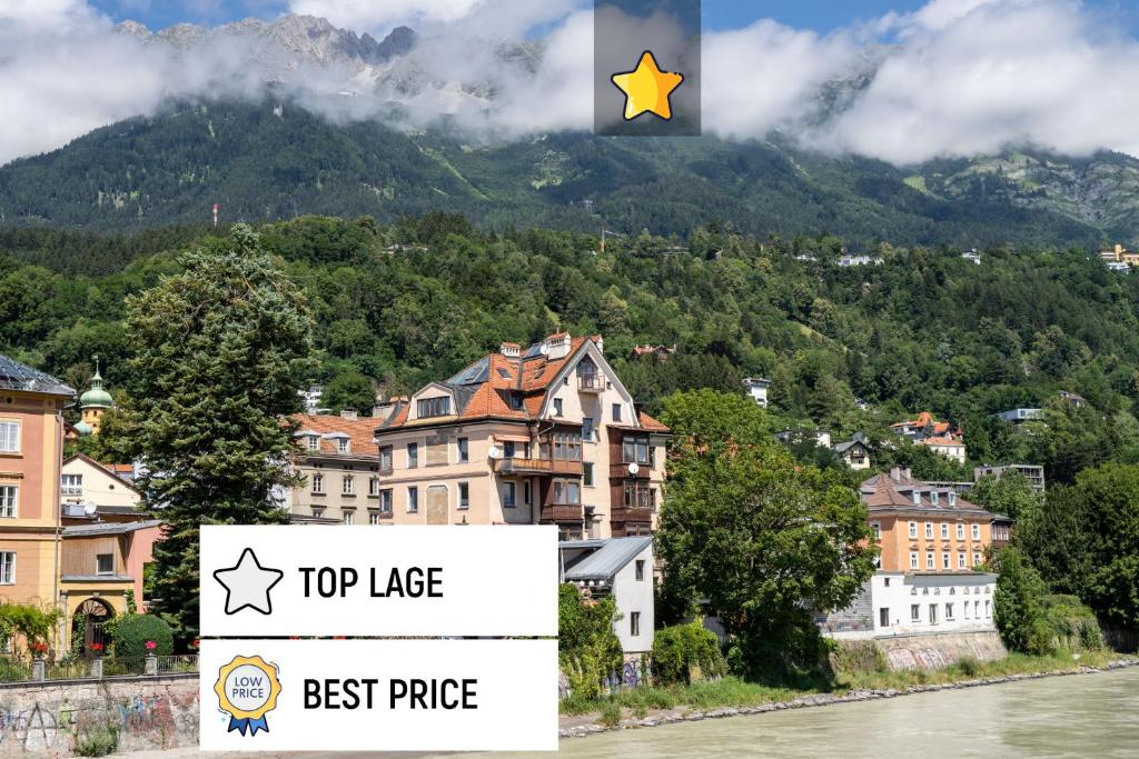 ein Top-Mietschild vor einer Stadt mit einem Berg in der Unterkunft Apartments im Herzen von Innsbruck in Innsbruck