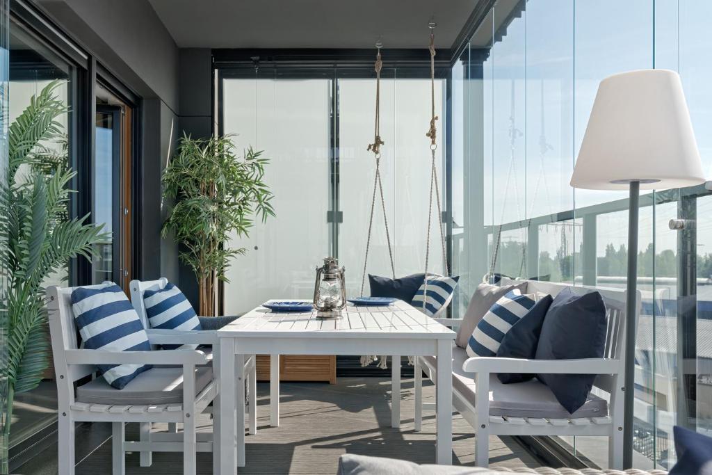 Balkón nebo terasa v ubytování Nadmotławie Sauna & Gym by Blue Mandarin