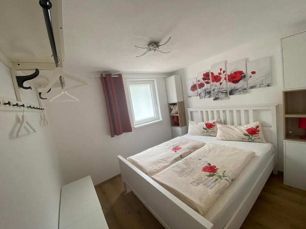 Posteľ alebo postele v izbe v ubytovaní Auszeit Salzkammergut Appartements