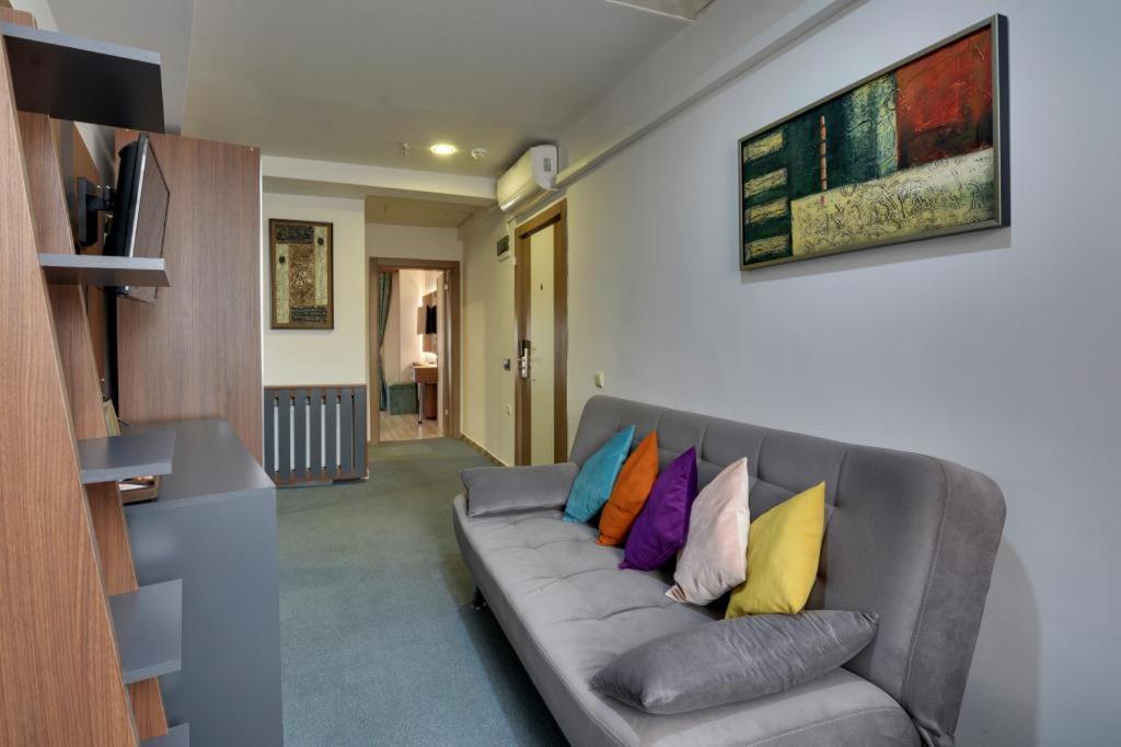 A seating area at Grande Stella Hotel