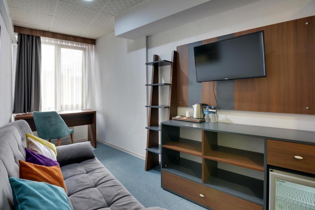 A kitchen or kitchenette at Grande Stella Hotel