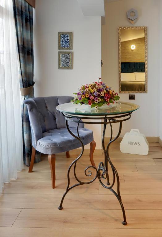 A seating area at Grande Stella Hotel