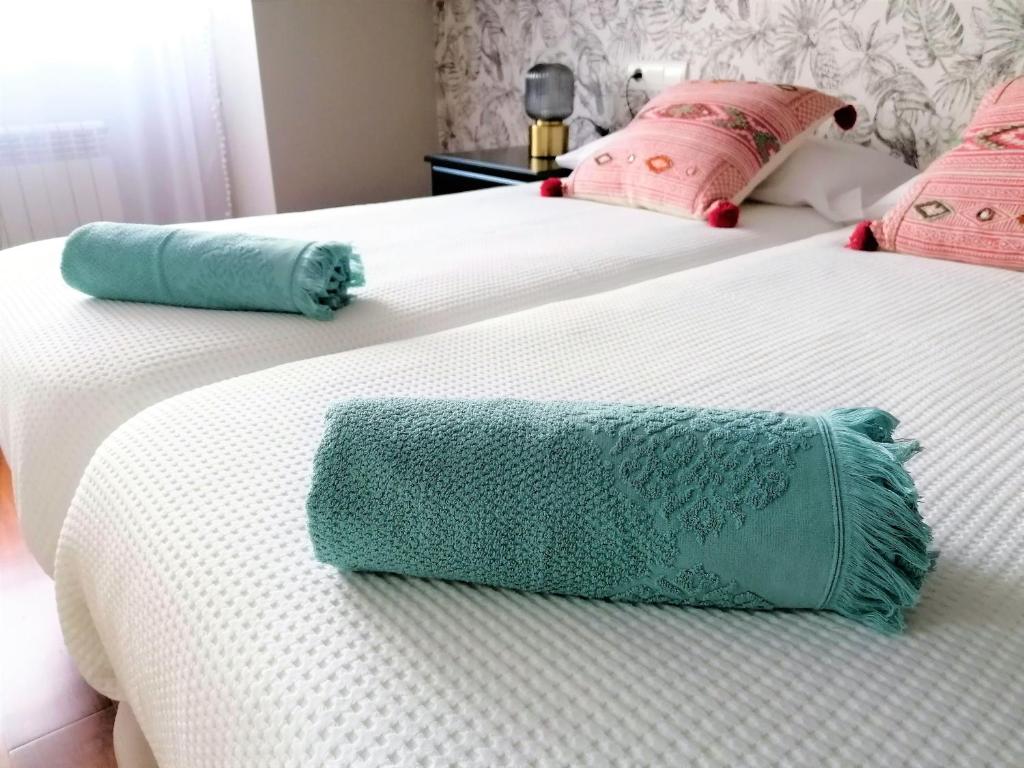 Postel nebo postele na pokoji v ubytování El Sumiciu