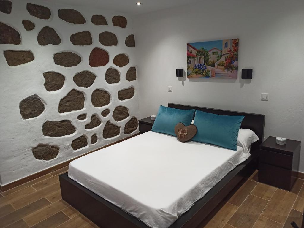 Кровать или кровати в номере Casa Leon