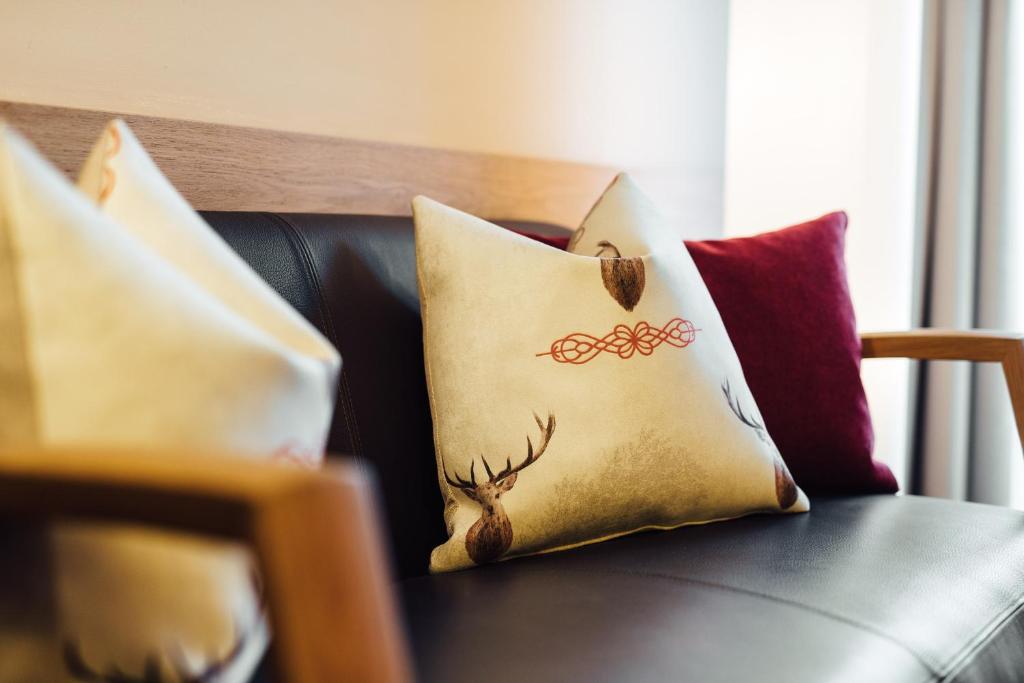 A seating area at Schneeweiss lifestyle - Apartments - Living