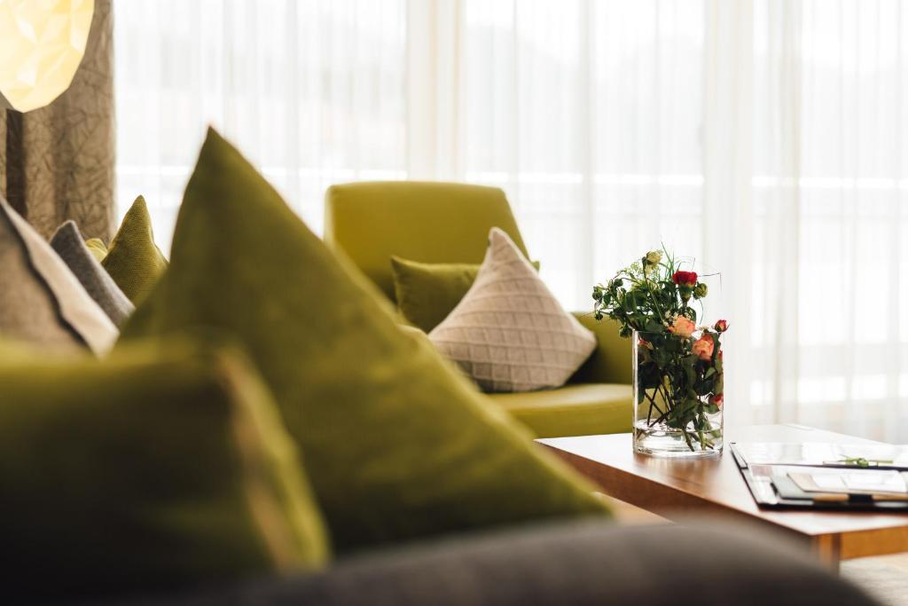 A seating area at Schneeweiss lifestyle - Apartments - Living
