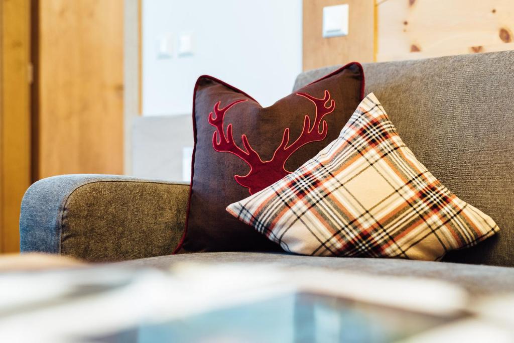 A seating area at Schneeweiss lifestyle - Apartments - Living