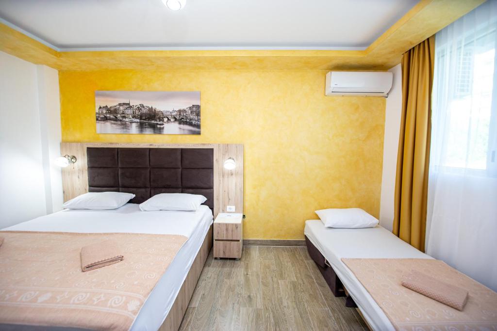 Posteľ alebo postele v izbe v ubytovaní Apartment Sofija