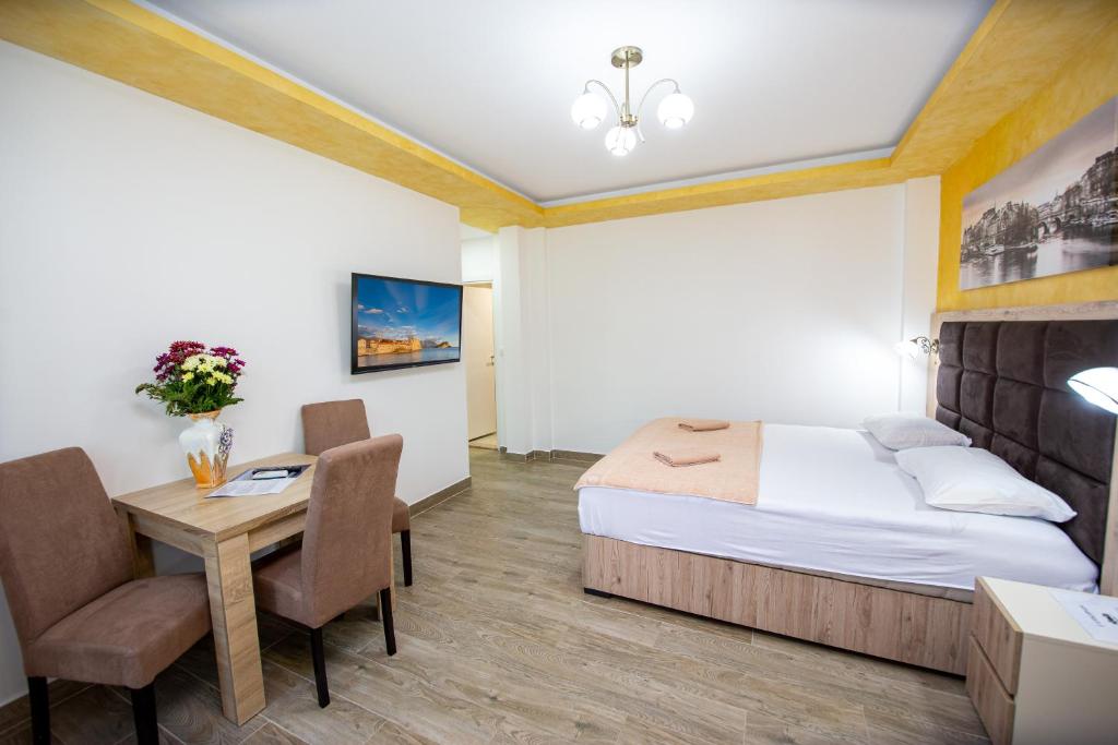 Posteľ alebo postele v izbe v ubytovaní Apartment Sofija