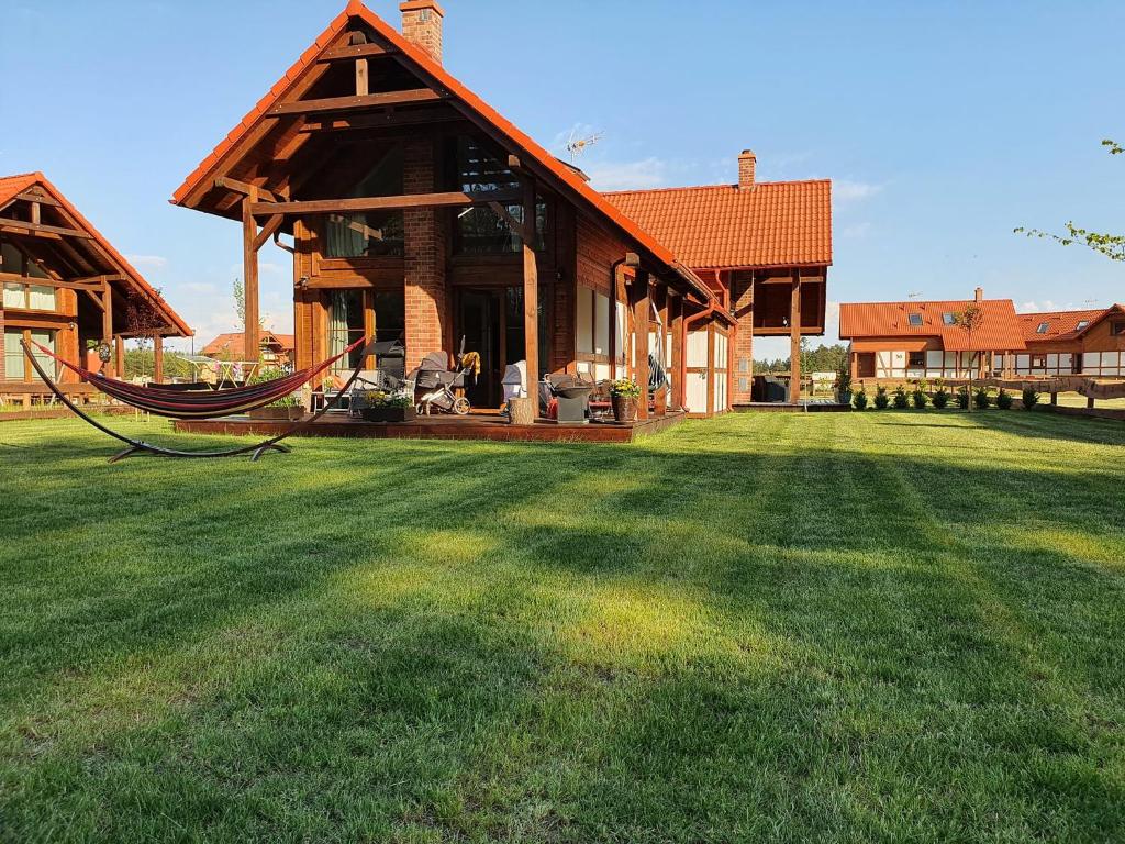 Zahrada ubytování Domek z basenem nad jeziorem Gwiazdy, Ostoja Bukowo, Kaszuby