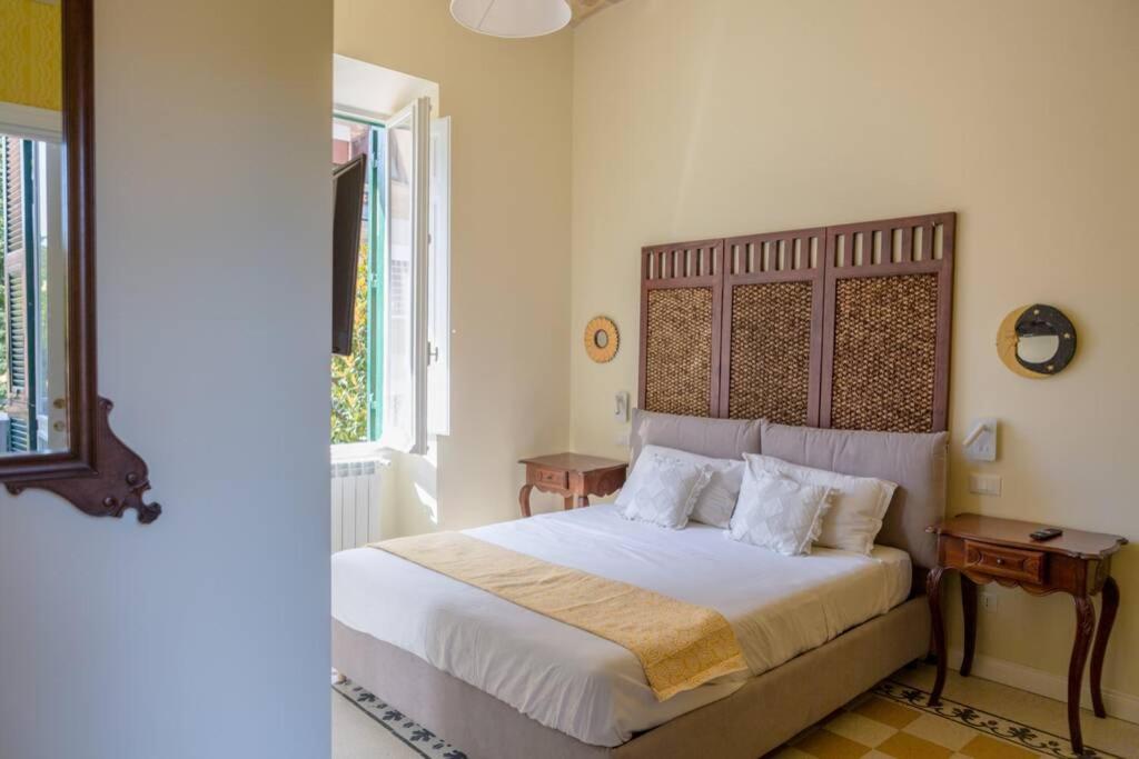Posteľ alebo postele v izbe v ubytovaní RomAntica Suite with balcony near San Giovanni