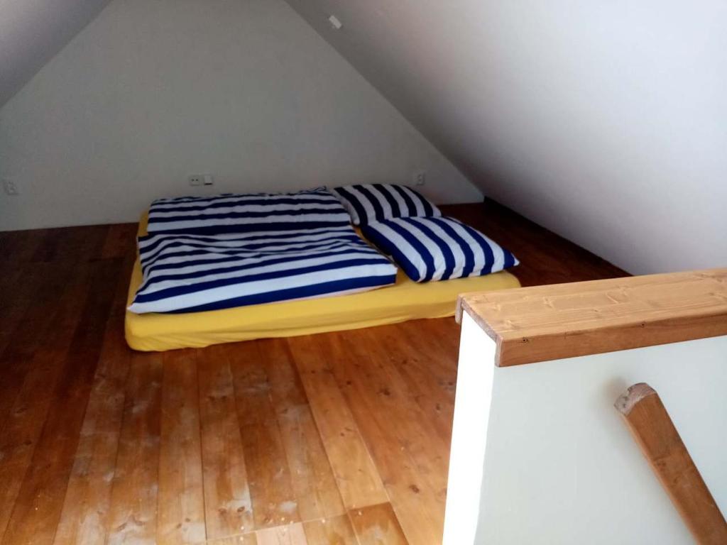 Postel nebo postele na pokoji v ubytování Penzion U Anděla