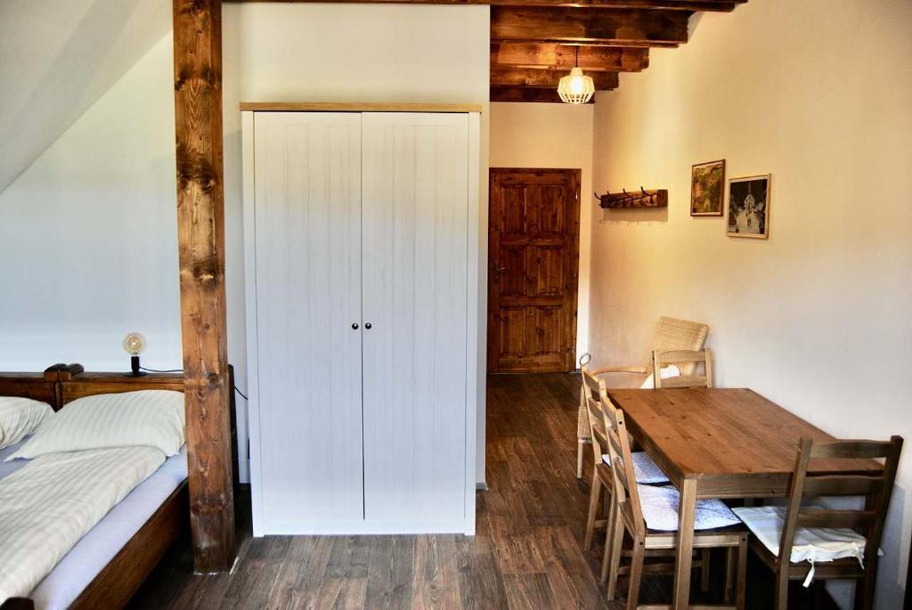 Postel nebo postele na pokoji v ubytování Penzion U Anděla