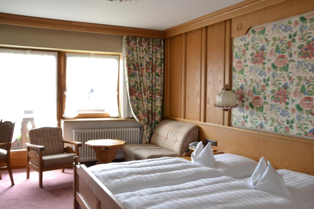 Postel nebo postele na pokoji v ubytování Hotel Gasthof Adler