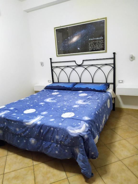 Postel nebo postele na pokoji v ubytování B&B Luna Blu