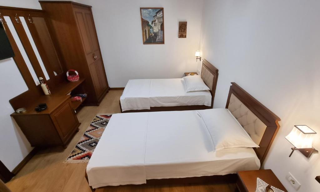 Postel nebo postele na pokoji v ubytování Master Hotel