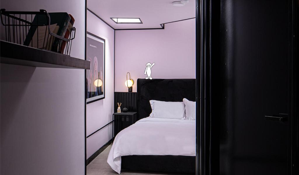 Postel nebo postele na pokoji v ubytování Casa Nada Hotel